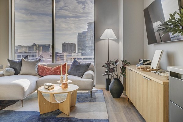 Spacious living room with modern furniture at The Worthington Apartments