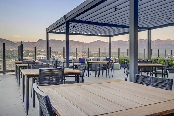 Elegant patio with modern seating at The Worthington Apartments, offering luxury living in a serene environment