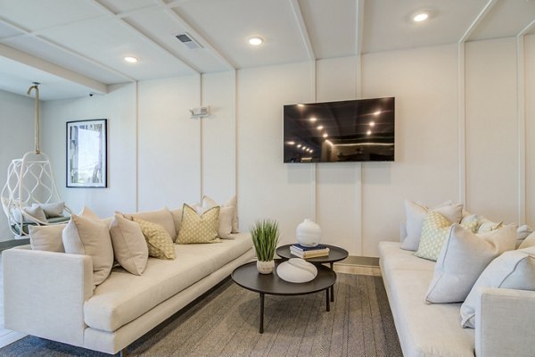 Clubhouse with modern design and ample seating at Solis Gainesville Apartments