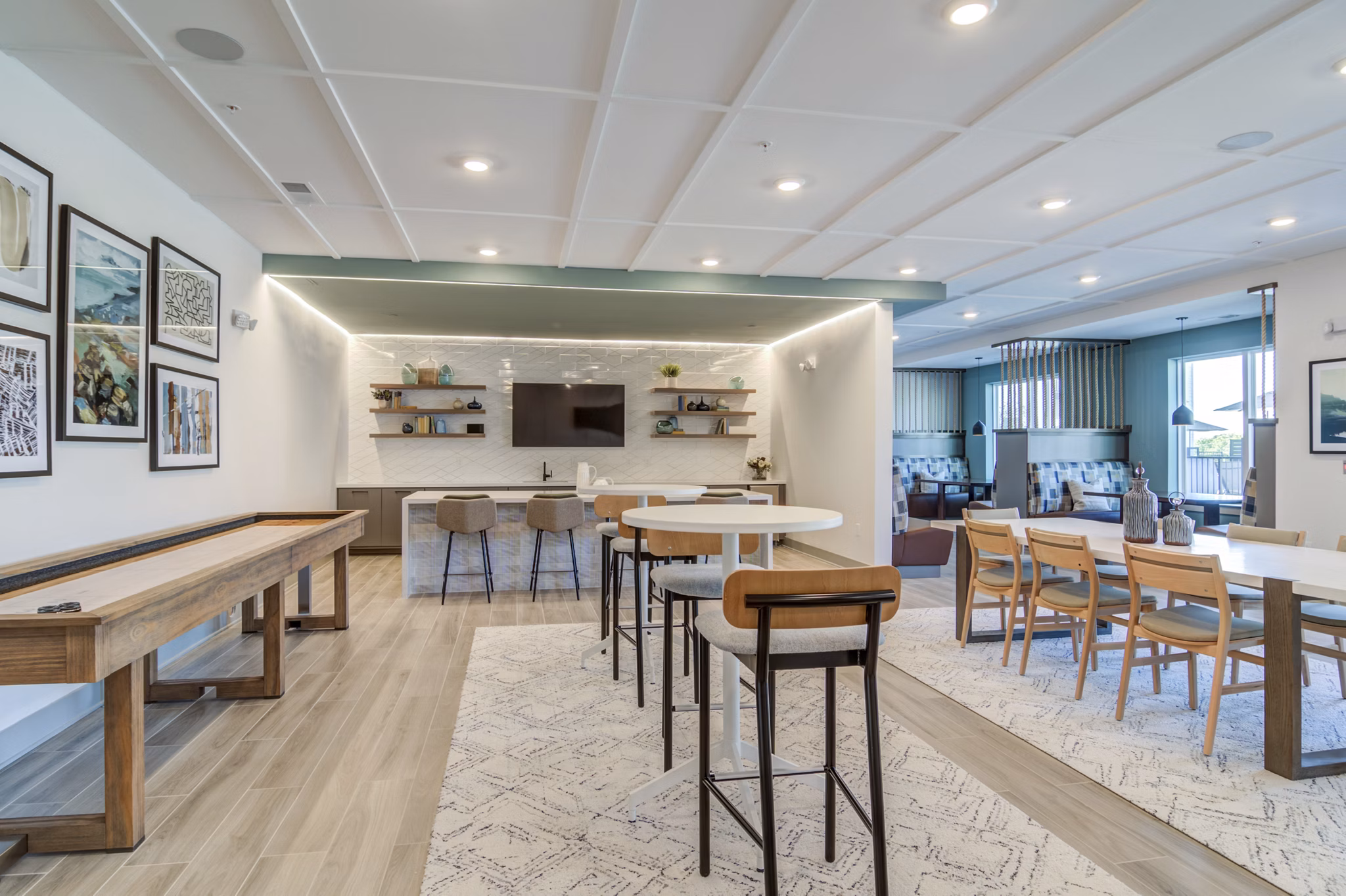 Stylish clubhouse with modern furnishings at Solis Gainesville Apartments, perfect for relaxation and social gatherings