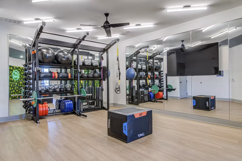 Modern fitness center with the latest equipment and spacious workout areas at Solis Gainesville Apartments