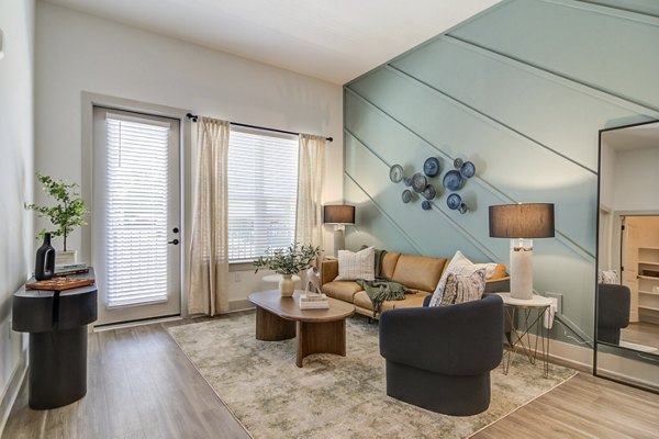 Spacious living room with modern decor in Solis Gainesville Apartments