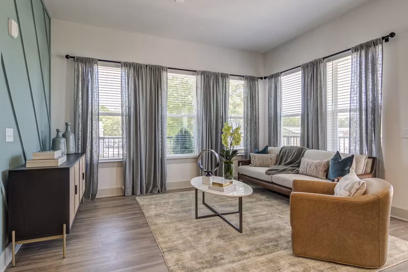 Modern living room with stylish decor and natural light at Solis Gainesville Apartments