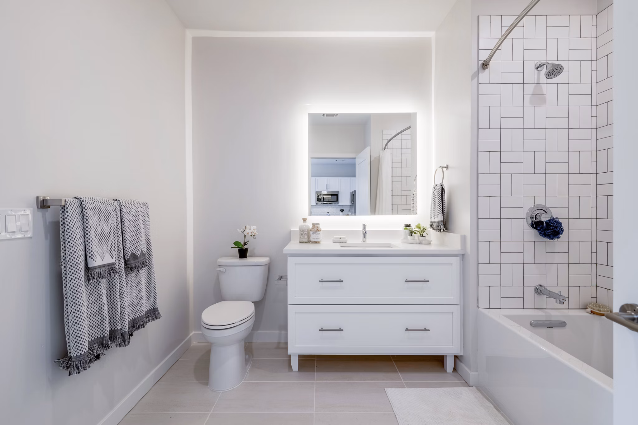 Modern bathroom with sleek fixtures at Riverside Wilton Apartments, offering luxury and comfort in a serene setting