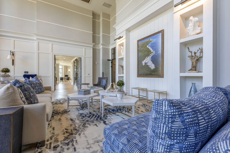 Clubhouse with modern design and comfortable seating at Newbrook Point Hope Apartments, ideal for gatherings and community events