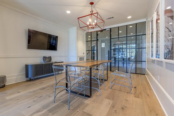 Modern meeting facility with sleek furnishings at Newbrook Point Hope Apartments