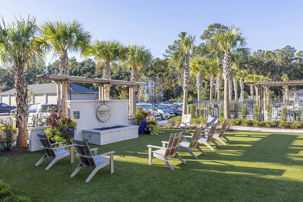 Courtyard featuring lush landscaping at Newbrook Point Hope Apartments