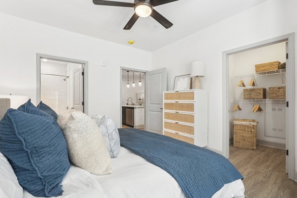 Cozy bedroom with modern furnishings at Waterside at Pepper Hall Apartments