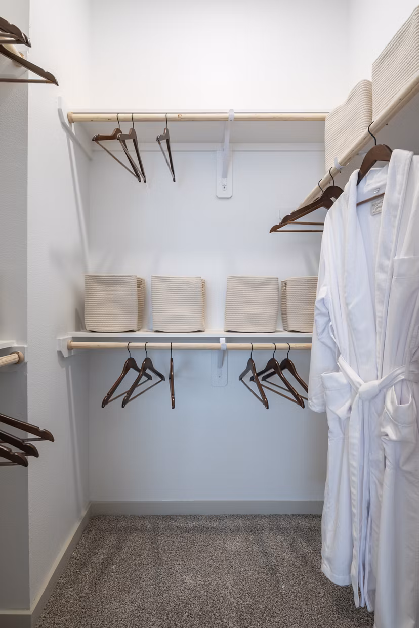 Walk-in closet with custom shelving at Broadstone Frontera Ridge luxury apartments