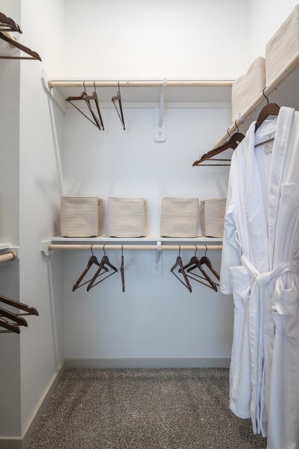 Walk-in closet with custom shelving at Broadstone Frontera Ridge luxury apartments
