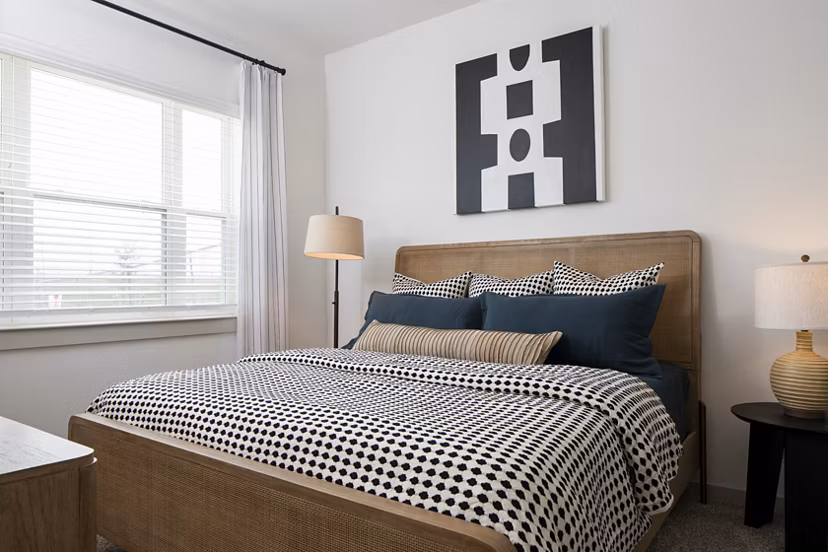 Bedroom featuring cozy decor and elegant lighting at Broadstone Frontera Ridge Apartments Perfect blend of comfort and style in luxury living