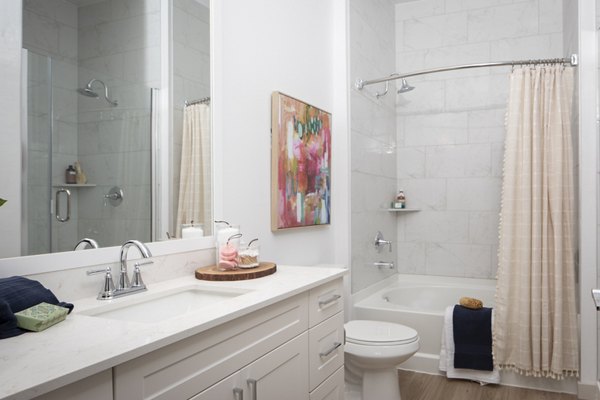 Modern bathroom with sleek finishes at Broadstone Frontera Ridge Apartments, featuring luxury fittings and stylish design