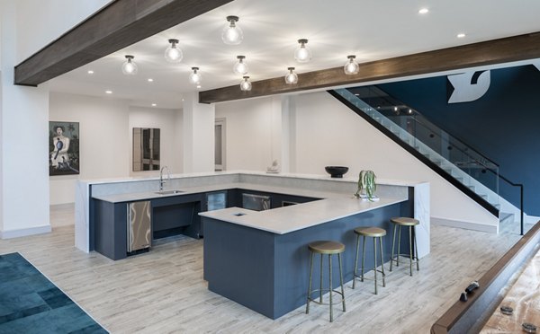 Stylish clubhouse with modern decor at Broadstone Frontera Ridge Apartments, ideal for gatherings and relaxation
