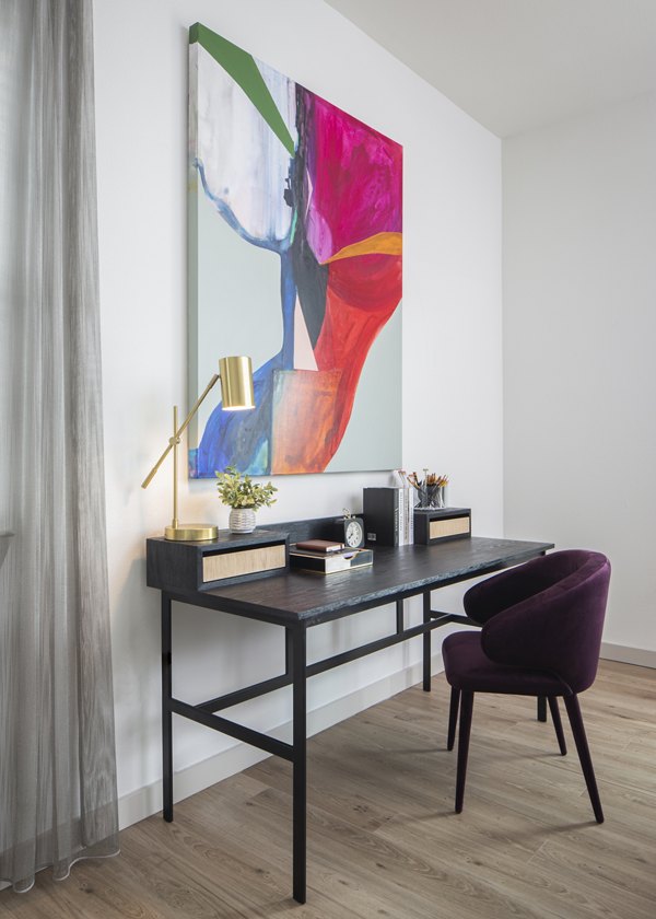 Modern home office with ergonomic furniture in Broadstone Frontera Ridge Apartments