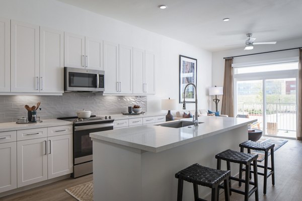 Modern kitchen with stainless steel appliances at Broadstone Frontera Ridge Apartments