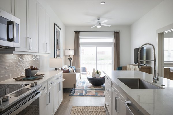 Modern kitchen with stainless steel appliances at Broadstone Frontera Ridge apartments