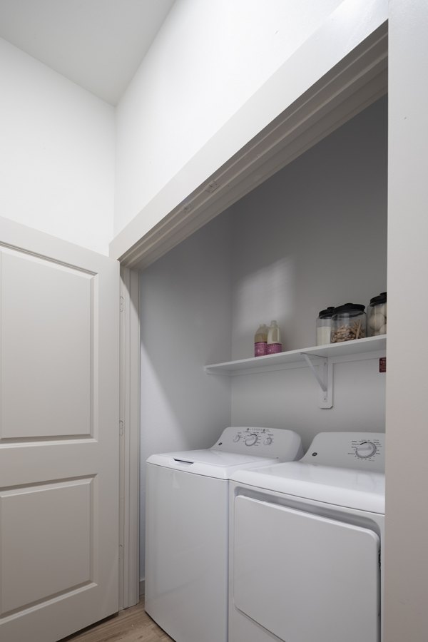 Laundry room with modern appliances at Broadstone Frontera Ridge Apartments