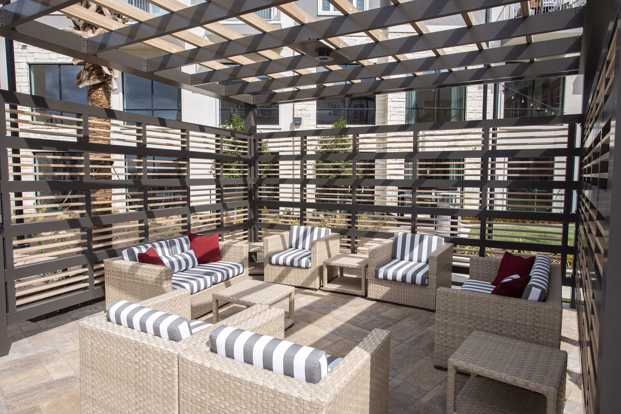Courtyard with landscaped gardens at Broadstone Frontera Ridge Apartments, ideal for relaxation and community events