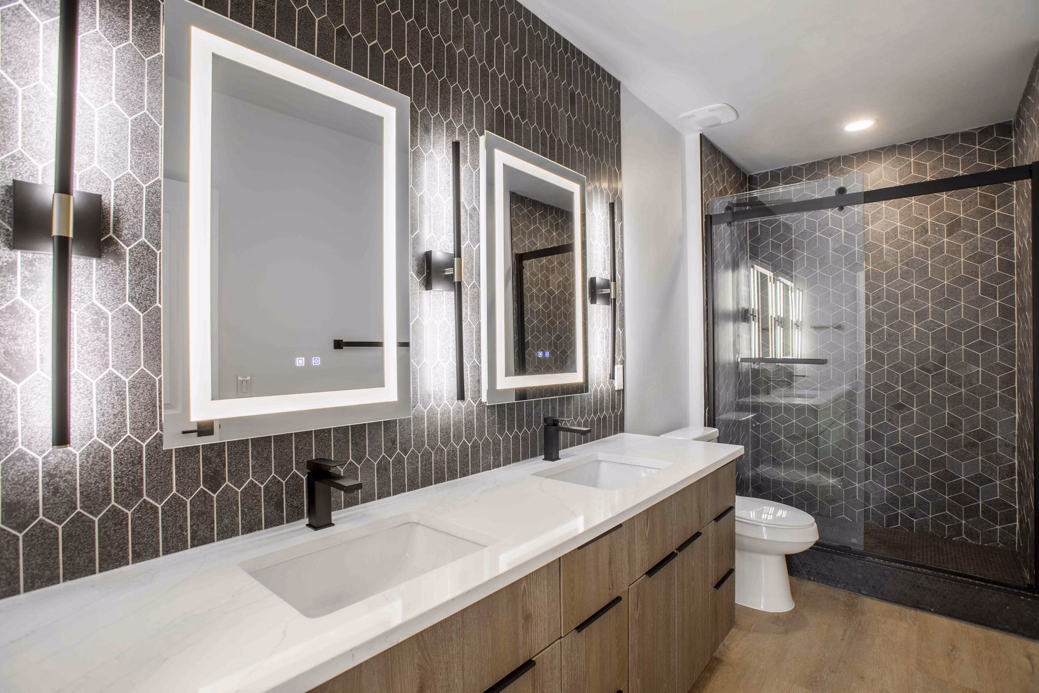 Luxurious bathroom with modern fixtures at Elliston 23 Apartments, featuring elegant design and spacious layout
