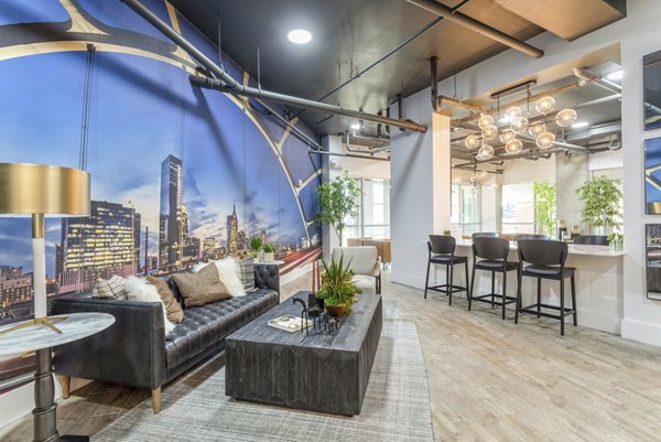 Clubhouse featuring modern design and comfortable seating at Elliston 23 Apartments