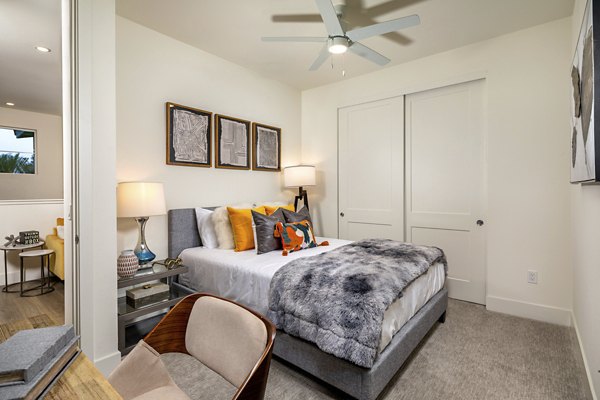 Spacious bedroom with modern decor at SolTerra Apartments featuring luxury living comforts
