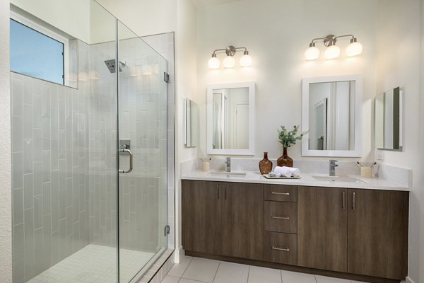 Modern bathroom with sleek fixtures at SolTerra Apartments: luxury living with premium amenities
