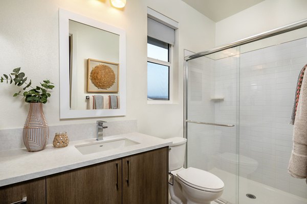 Bathroom featuring modern fixtures and sleek design at SolTerra Apartments
