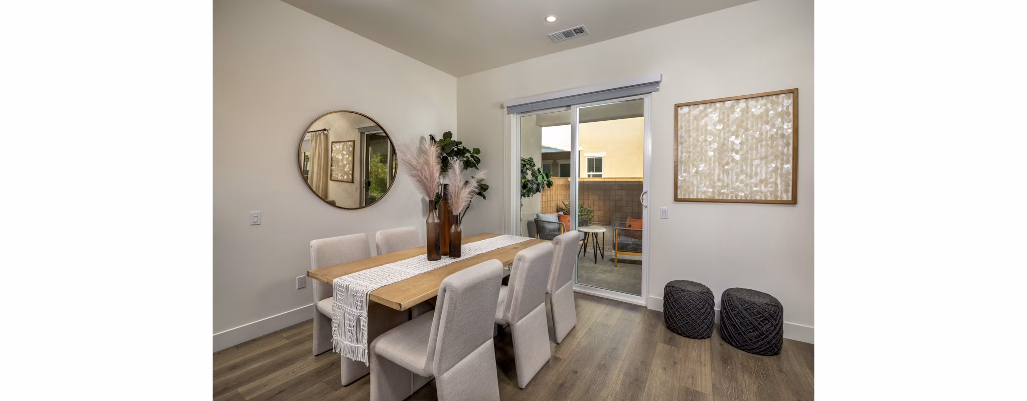 Dining area with modern design and elegant seating at SolTerra Apartments, a luxury property managed by Greystar
