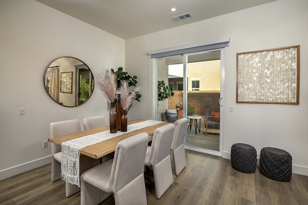Dining area with modern design and elegant seating at SolTerra Apartments, a luxury property managed by Greystar