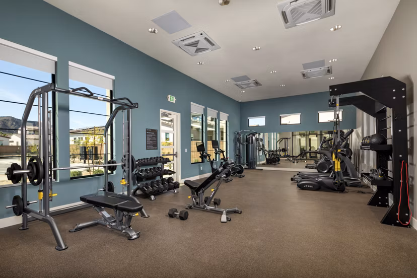 Well-equipped fitness center with modern exercise machines at SolTerra Apartments