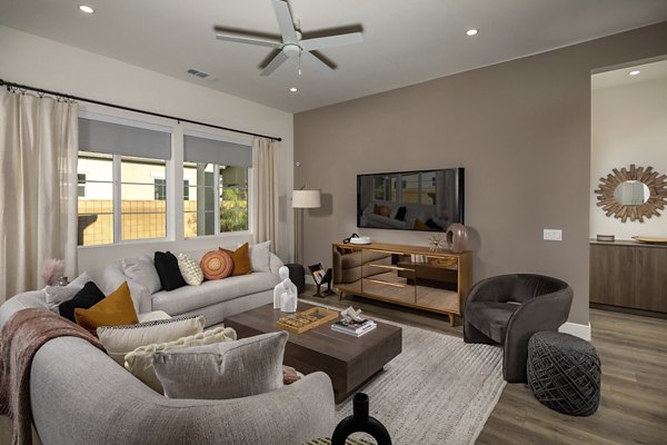 Stylish living room with contemporary furnishings at SolTerra Apartments in scenic surroundings