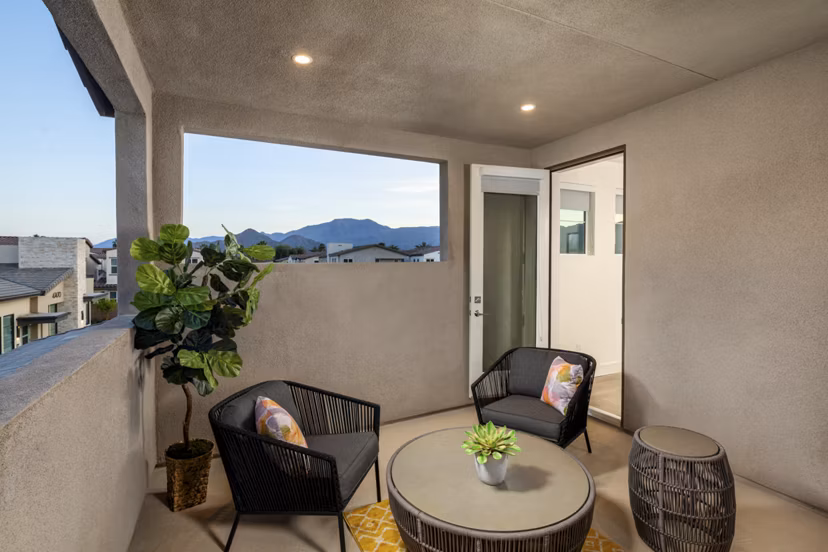 Spacious outdoor patio with modern furniture at SolTerra Apartments, perfect for entertaining or relaxing in a luxury setting