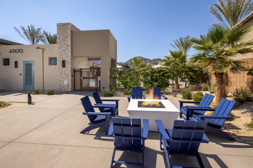 Cozy fire pit area at SolTerra Apartments, featuring comfortable seating and ambient lighting in a luxury apartment community