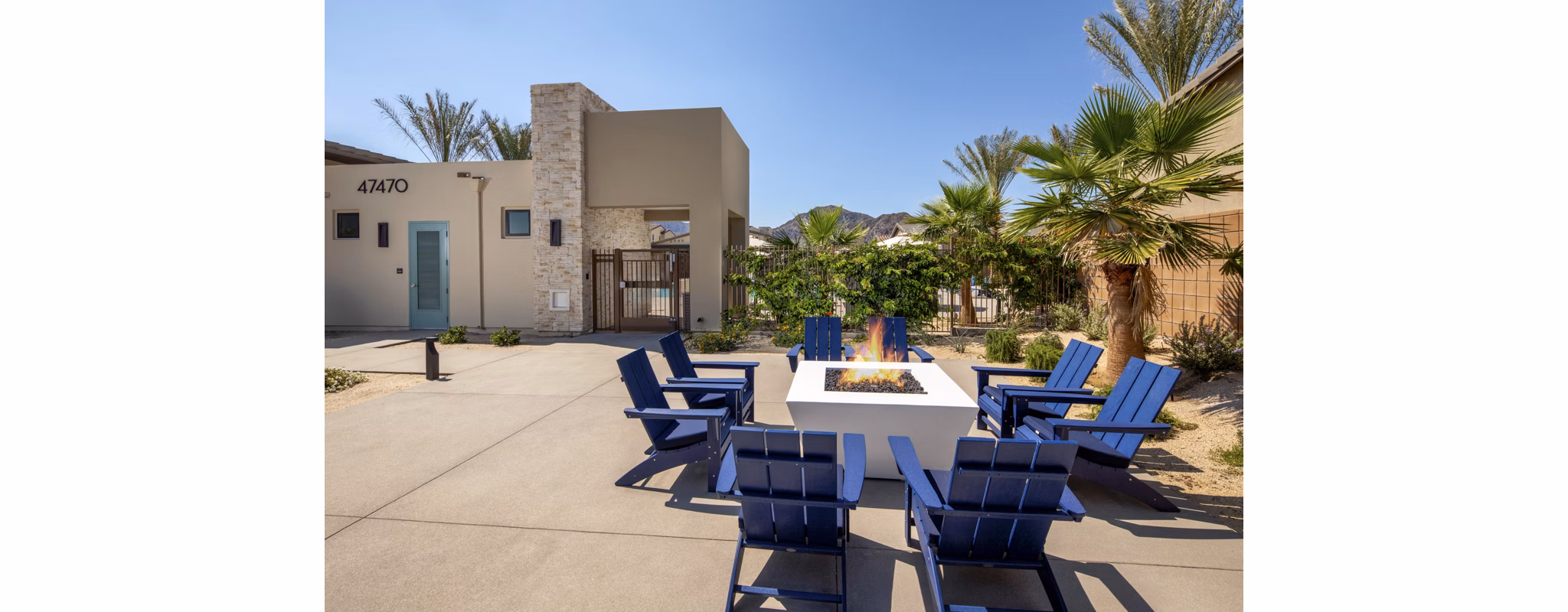 Cozy fire pit area at SolTerra Apartments, featuring comfortable seating and ambient lighting in a luxury apartment community