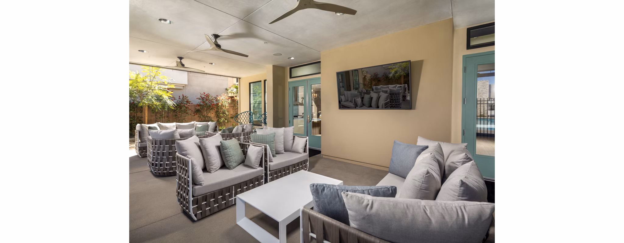 Inviting courtyard with landscaped gardens at SolTerra Apartments, a luxury living community