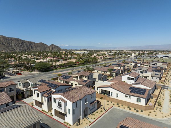 SolTerra Apartments: Luxury view from high-rise balcony with cityscape backdrop