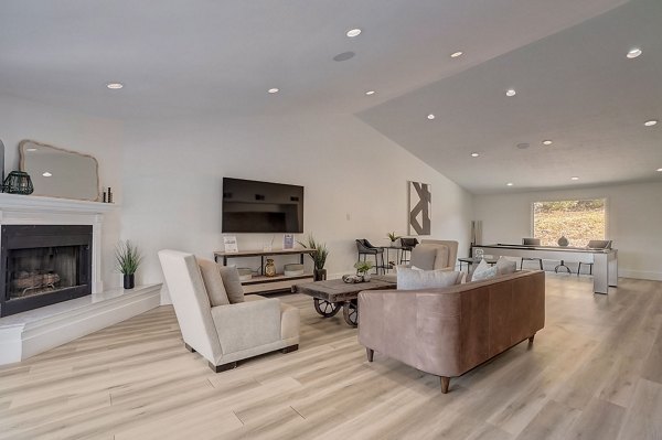 Clubhouse space with modern design at Brentwood Oaks Apartments, offering a sophisticated environment for social gatherings and relaxation