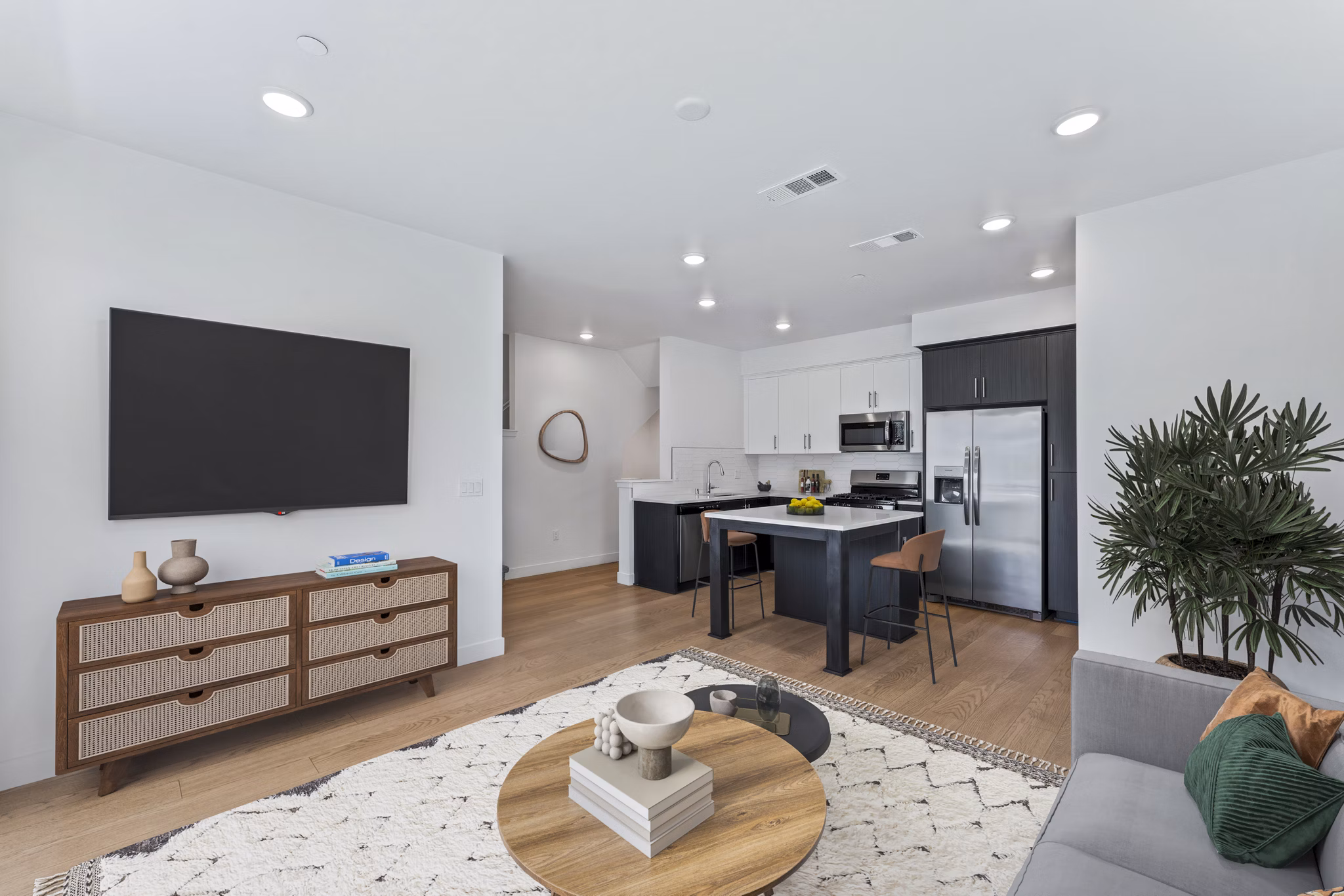 Spacious living room with modern decor at Ascent at Campus of Life Apartments