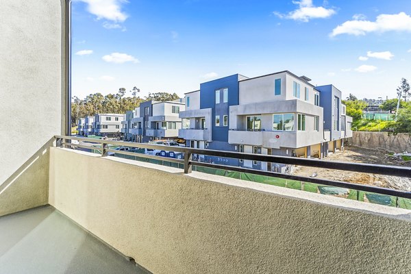 Scenic patio with modern seating at Ascent at Campus of Life Apartments, ideal for outdoor relaxation and entertaining