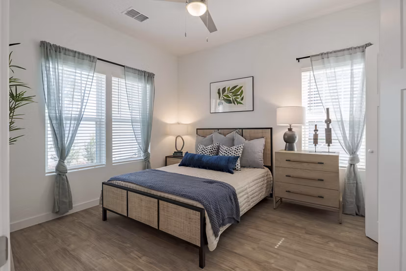 Bedroom featuring modern decor and cozy ambiance at Eden Magnolia Village Apartments