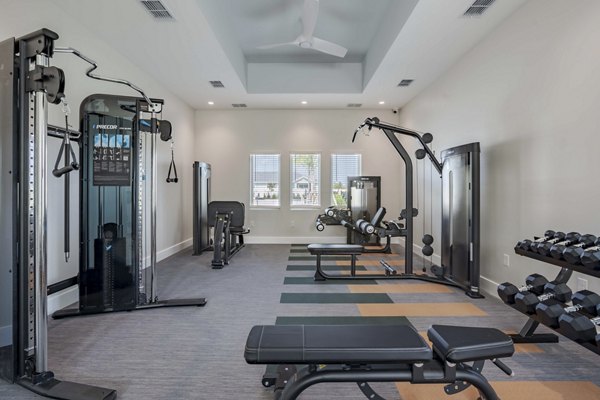 Modern fitness center with state-of-the-art equipment at Eden Magnolia Village Apartments
