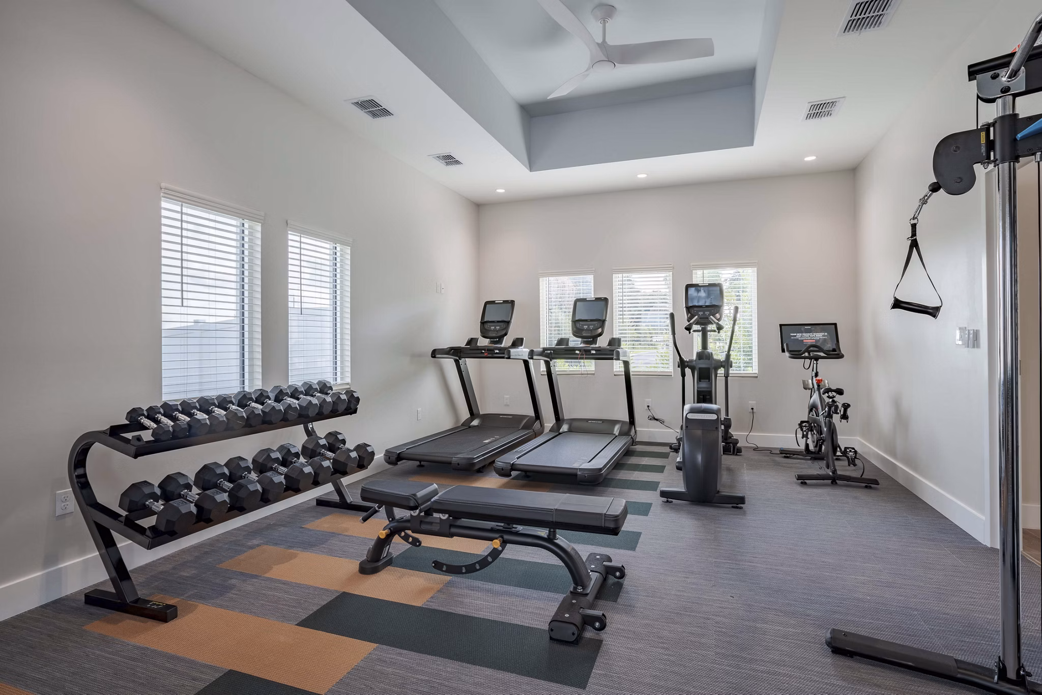 State-of-the-art fitness center with modern equipment at Eden Magnolia Village Apartments