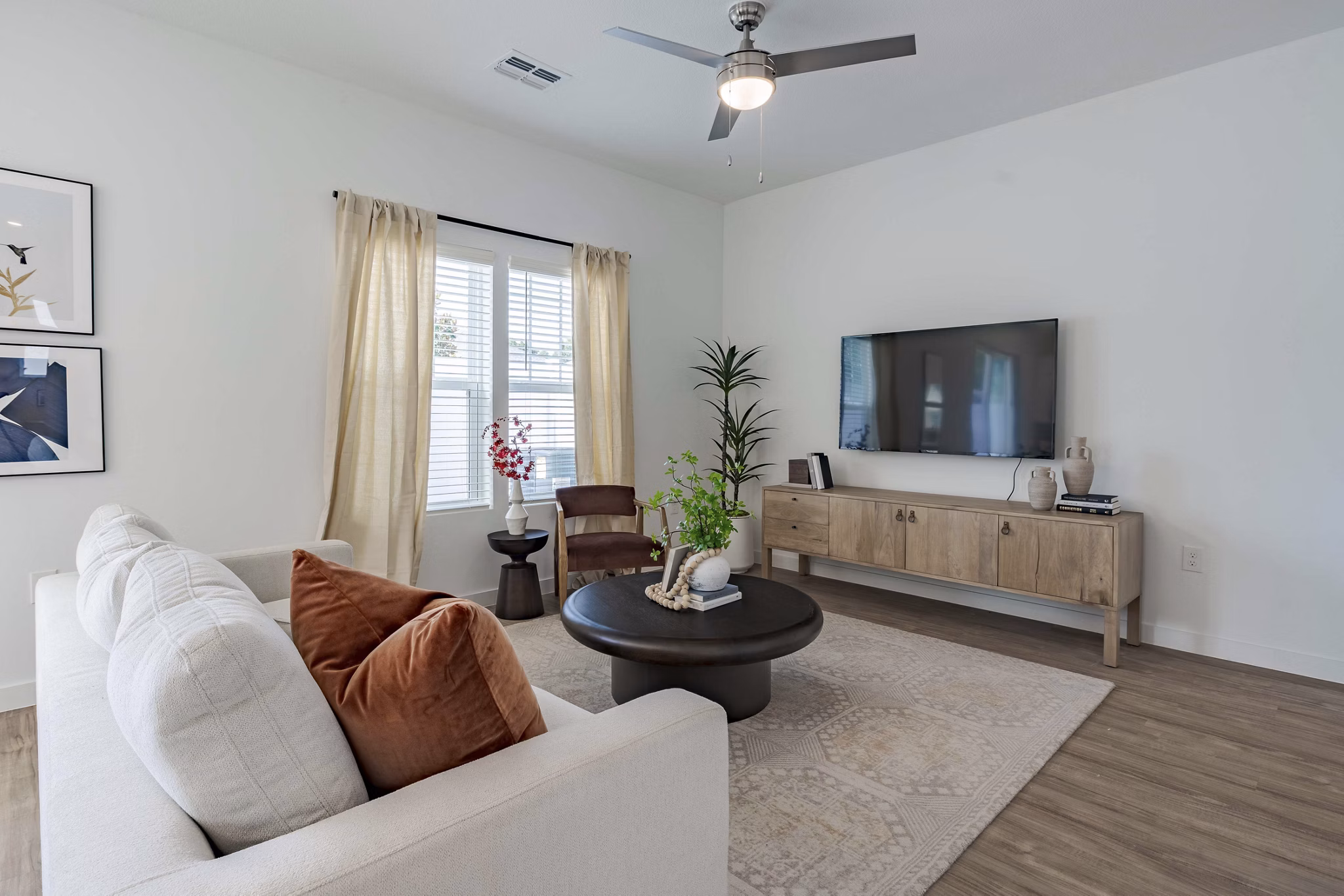 Living room with contemporary decor at Adaptive Image Eden Magnolia Village Apartments