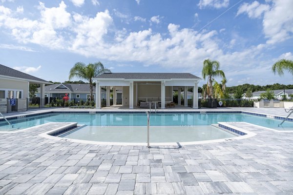 Resort-style pool at Adaptive Image Eden Magnolia Village Apartments, ideal for relaxation and recreation in a luxury apartment setting