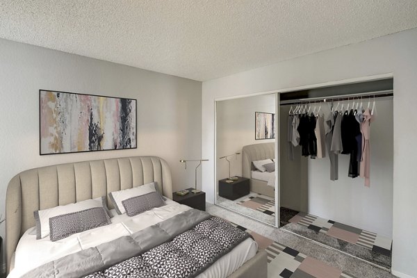 Cozy bedroom with neutral decor at Sundance Apartments