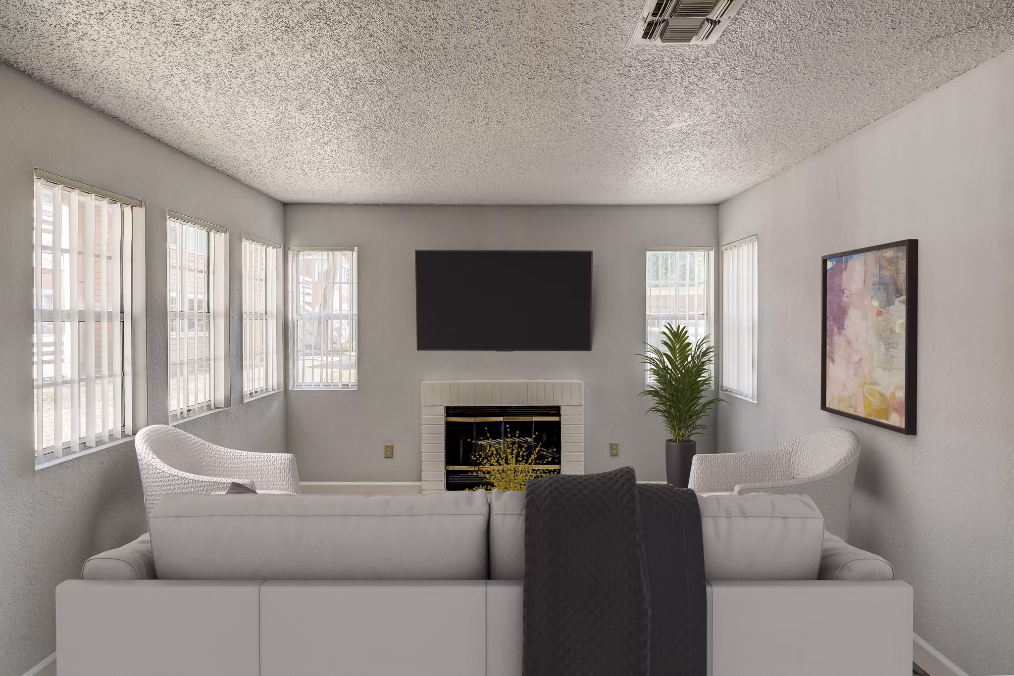 Modern living room with stylish furniture and natural light in Sundance Apartments
