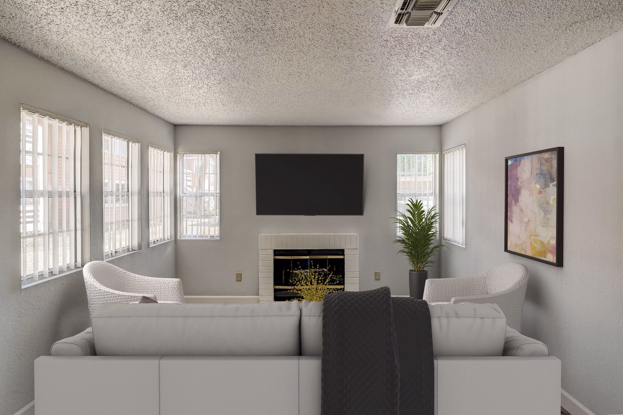 Modern living room with stylish furniture and natural light in Sundance Apartments