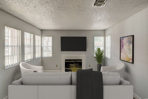 Modern living room with stylish furniture and natural light in Sundance Apartments