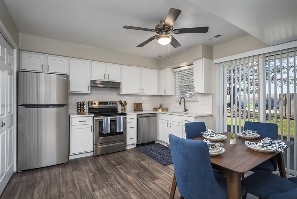 Dining area, modern accents, and ample seating in Haven on Long Grove Apartments