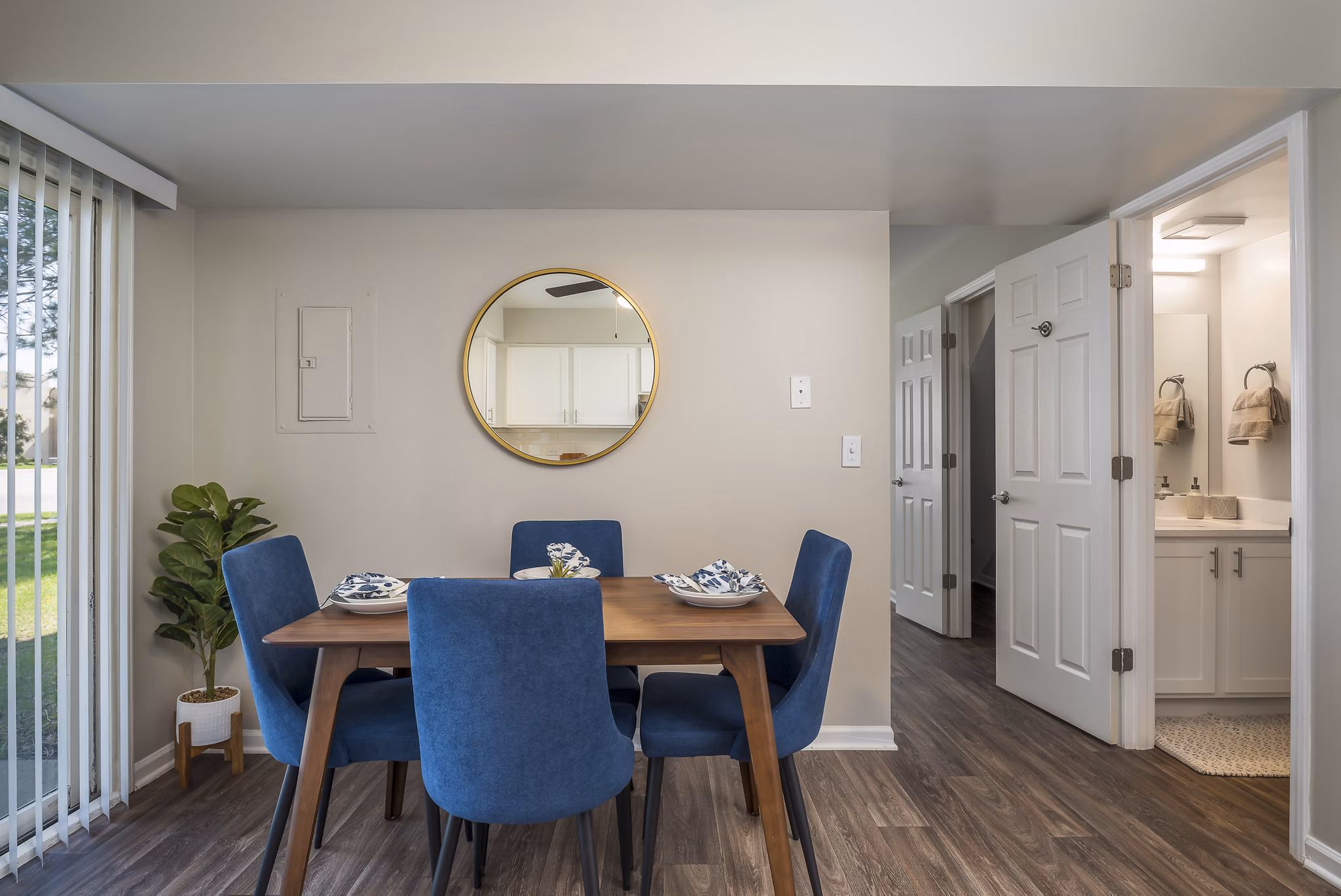 Dining area with modern furnishings and natural light at Haven on Long Grove Apartments